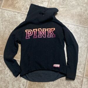 Pink sweatshirt.